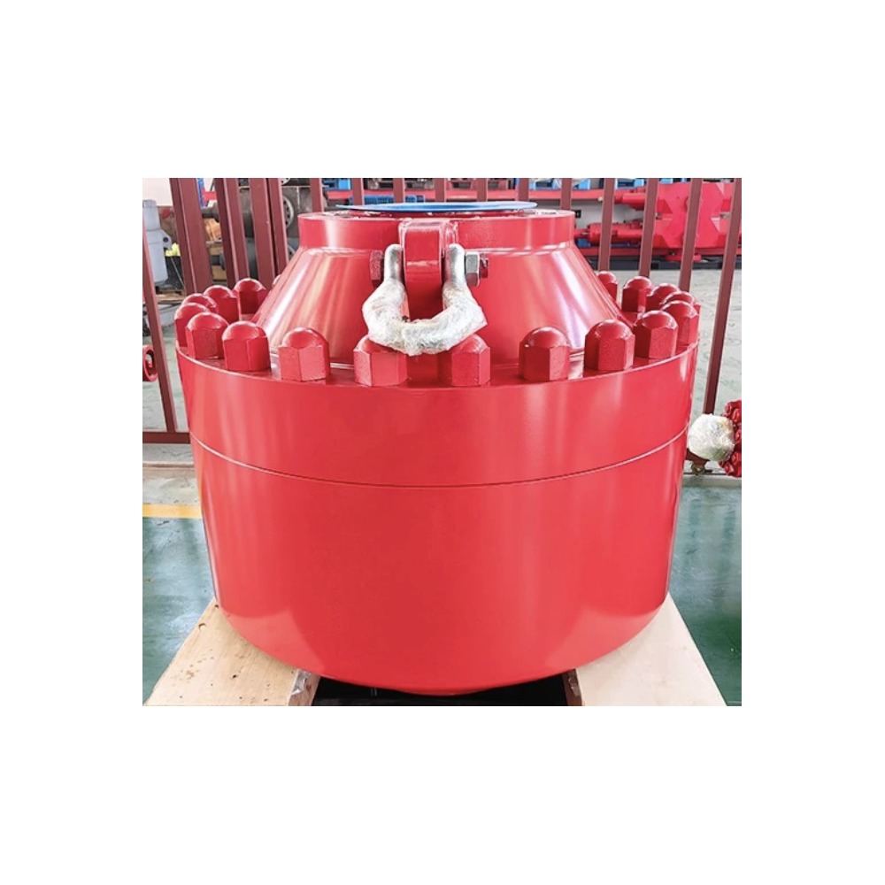 CAMTOP 11" 5M psi Bolted-Cover Spherical BOP actual product photo - red epoxy-coated forged steel body, top studded cover with green-painted B7 bolts, lifting eye shackle, API 16A Class with data nameplate