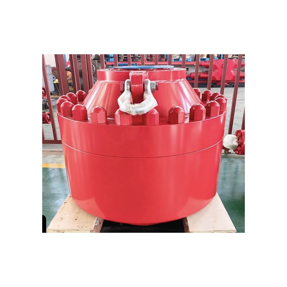 CAMTOP 13-5/8" 5M psi Bolted-Cover Spherical BOP actual product photo — red epoxy-coated forged steel body, top studded cover with red-painted B7 bolts, lifting shackle, API 16A Class with nameplate, wooden pallet for shipping